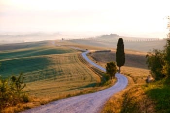 tramonto-toscana-cipressi-colline